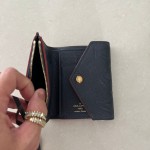 Louis Vuitton - Carteira compacta em couro empreinte 
